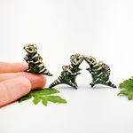 Spinosaurus fossil pendant