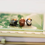 Rhinoceros beetle with a gold star pendant