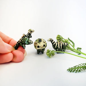 Diplodocus fossil pendant