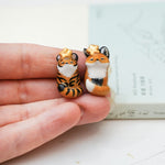 Tiger with a star pendant