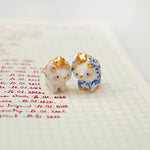 Triceratops with a star and porcelain pattern pendant