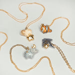 Lion with a star pendant