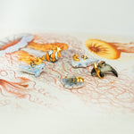 Porpoise with a star pendant