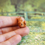 Bear with a fern pendant