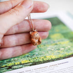 Bear with a fern pendant