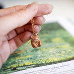 Bear with a fern pendant