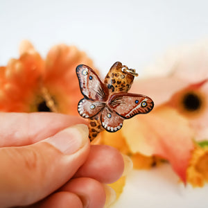 Bengal cat with moth wings pendant