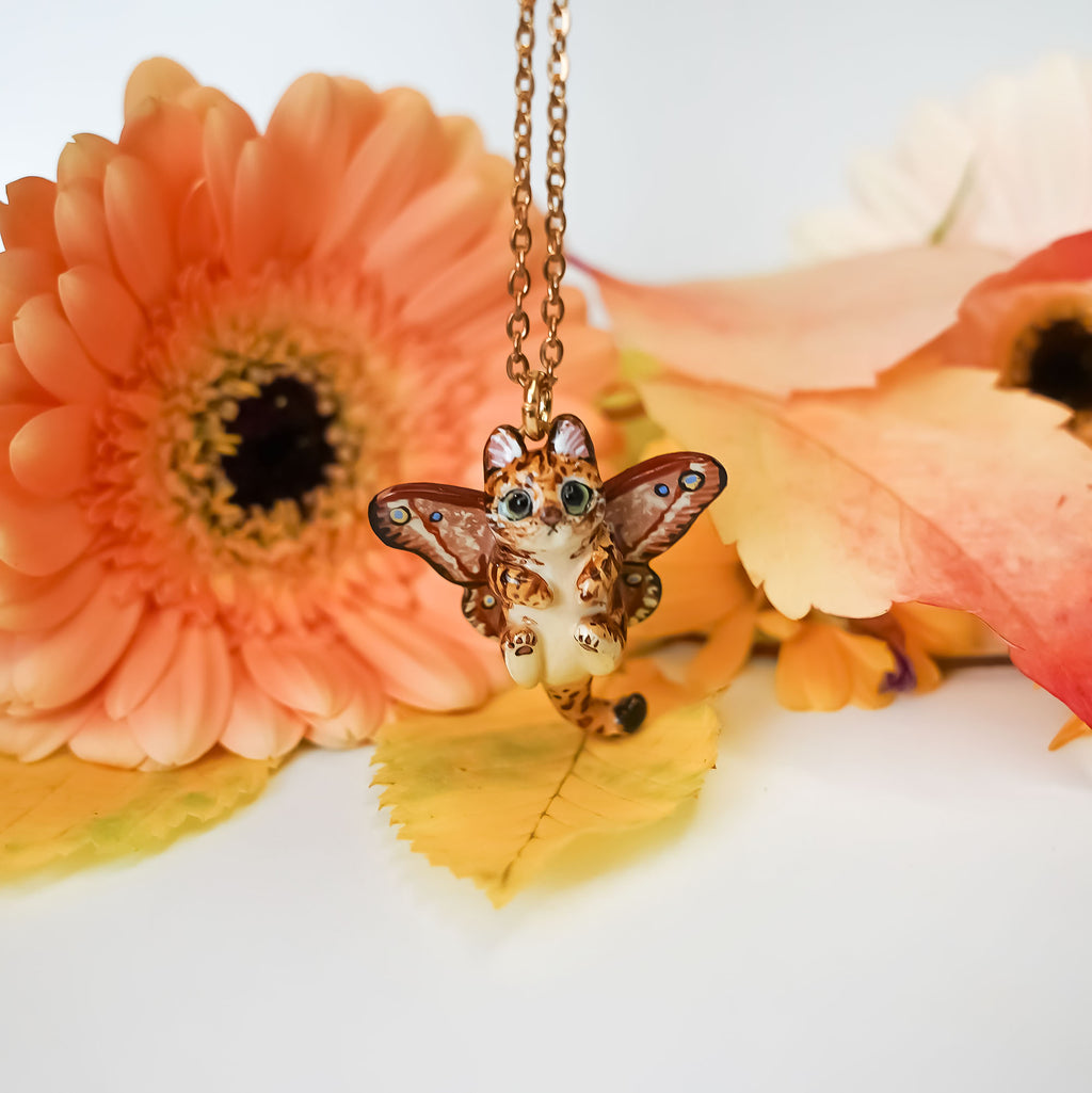 Bengal cat with moth wings pendant