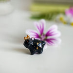 Black bear with the moon pendant