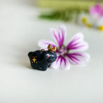 Black bear with the moon pendant