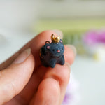 Black bear with the moon pendant