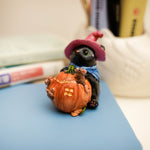 Black Bear with pumpkin's house figurine