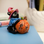 Black Bear with pumpkin's house figurine