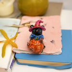 Black Bear with pumpkin's house figurine