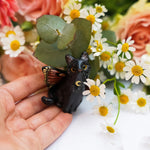 Black Catfly with pink butterfly wings