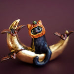 Black cat on the Moon figurine