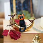 Black cat on the Moon figurine