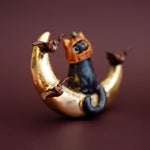 Black cat on the Moon figurine