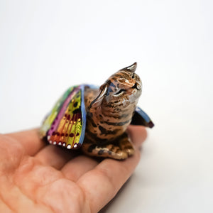 Black footed cat with butterfly wings