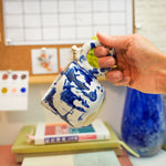 Ceramic cup with a porcelain cat