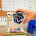 Ceramic cup with a porcelain cat