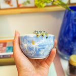 Porcelain cup with a tiger