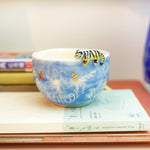Porcelain cup with a tiger