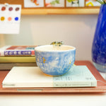 Porcelain cup with a tiger