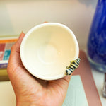 Porcelain cup with a tiger