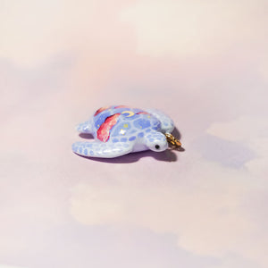 Sea turtle with the moon pendant