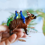 Bongo with the paradise squad figurine