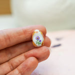 Bunny with a fern pendant