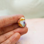 Bunny with a fern pendant