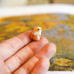 Bunny with a fern pendant