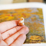 Bunny with a fern pendant