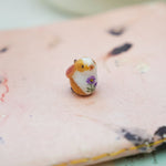 Bunny with a fern pendant