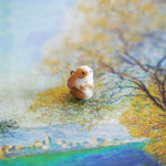 Bunny with a fern pendant