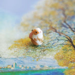 Bunny with a fern pendant