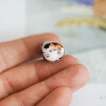 Calico Cat in the meadow pendant