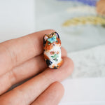 Calico Cat in the meadow pendant