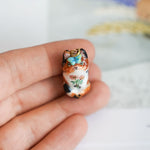 Calico Cat in the meadow pendant