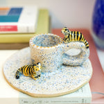 Ceramic candlestick with tigers