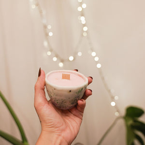 Candle in porcelain cup