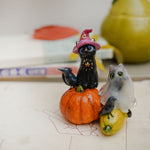 Cats on the pumpkins figurine