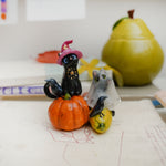 Cats on the pumpkins figurine