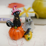Cats on the pumpkins figurine