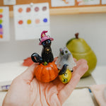 Cats on the pumpkins figurine