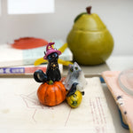 Cats on the pumpkins figurine