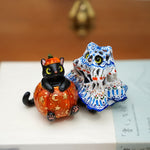 Black cats figurine