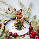 Cheetah with a Christmas tree